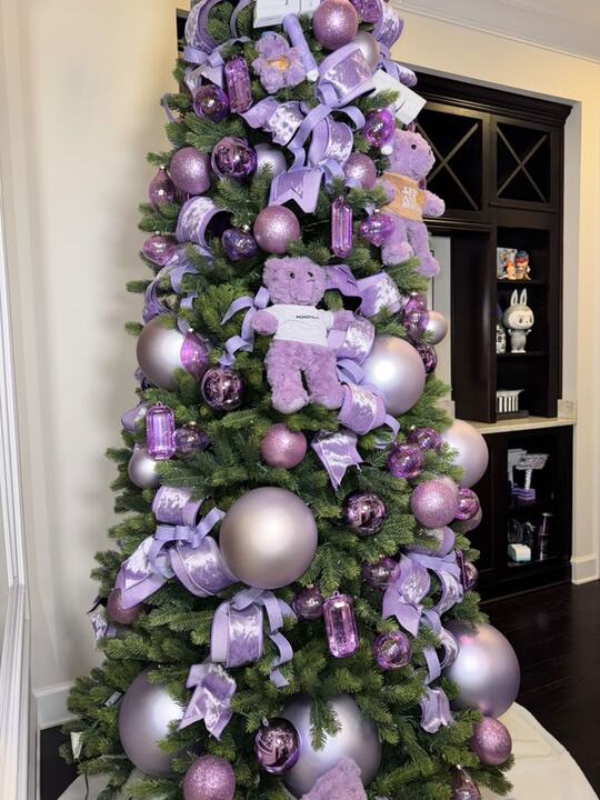 Tree dressed in lavender ribbon, lilac ornaments and plush bears