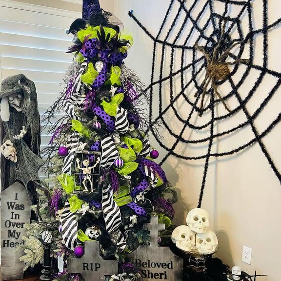 Halloween tree in purple and lime with a giant spider web